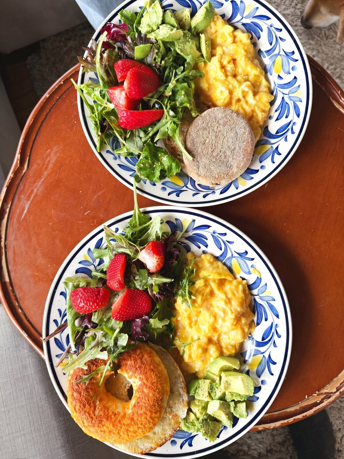 A bright, colourful plate of avocado toast and greens